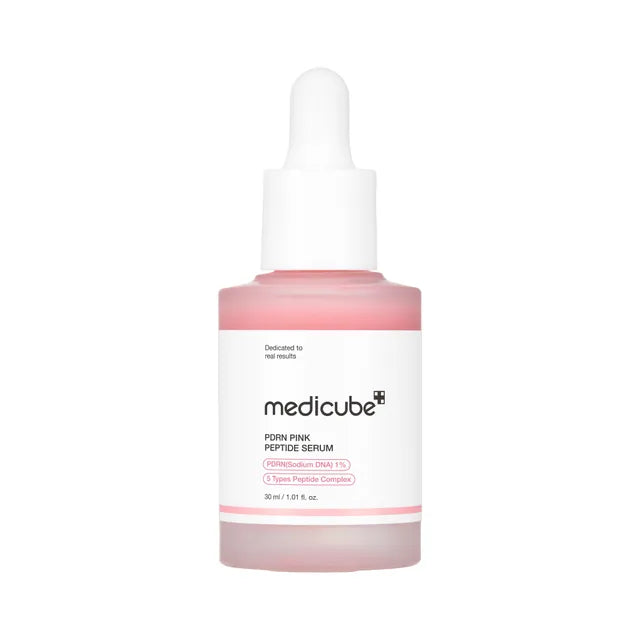 Medicube PDRN Pink Peptide Serum in a pink and white bottle